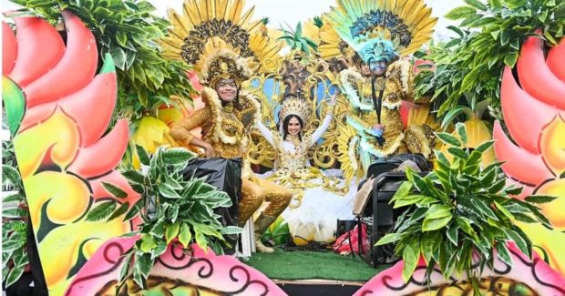 COLOR ME PINEAPPLE Contingents of dancers in colorful costumes perform during the revival of Piña Festival in Ormoc City on June 26. The event, staged to promote the city’s pineapple industry, has been revived this year following a two-year hiatus due to the pandemic. —PHOTO COURTESY OF ELITE