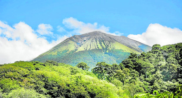 The image shows a calm Mt. Kanlaon, one of the country's active volcanoes but on July 7, 2022, Phivolcs warned the volcano was showing signs of phreatic eruption.