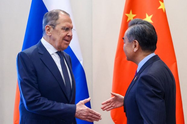 Russian Foreign Minister Sergei Lavrov meets with his Chinese counterpart Wang Yi in Denpasar, Indonesia on July 7, 2022.