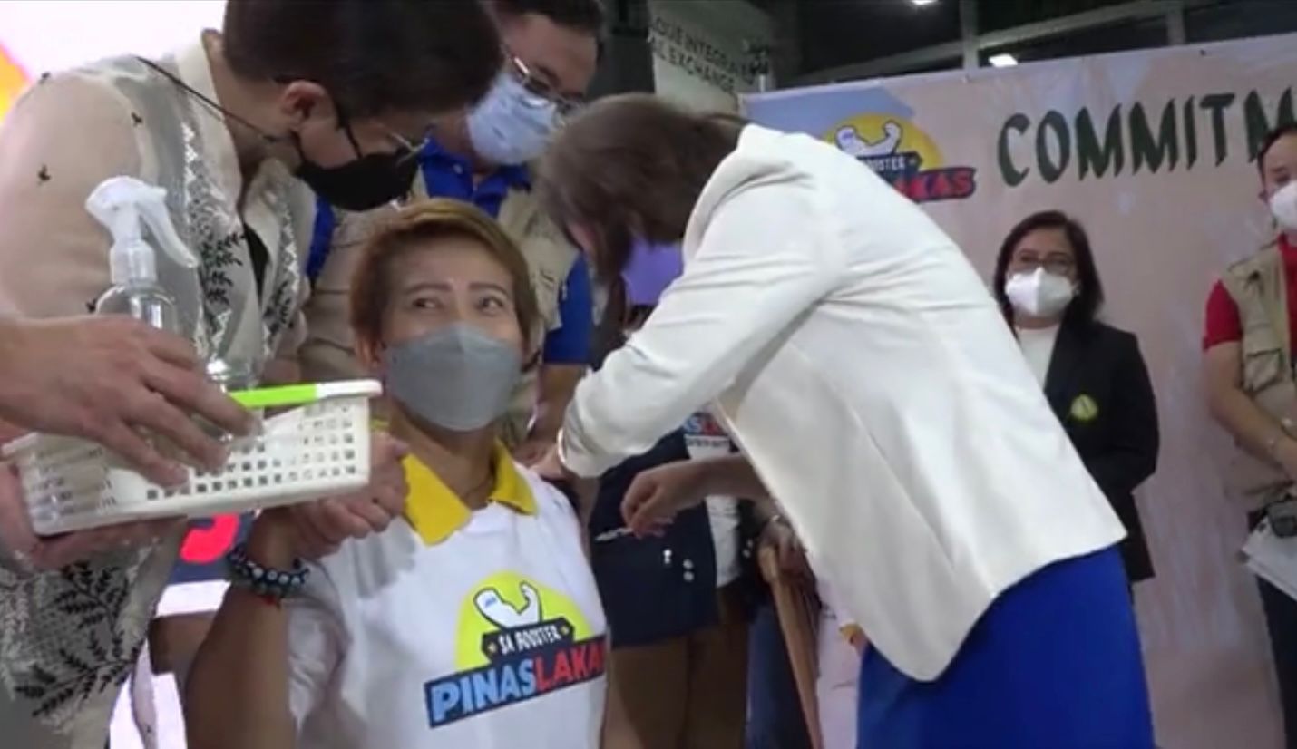 Several officials participate in the ceremonial vaccination during the launch of the "PinasLakas" campaign at the Parañaque Integrated Terminal Exchange (PITX). | Photo screengrabbed from DOH live