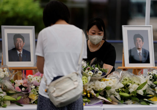 Mourners gather at the altar for the memorial of late former Japanese Prime Minister Shinzo Abe, in Tokyo