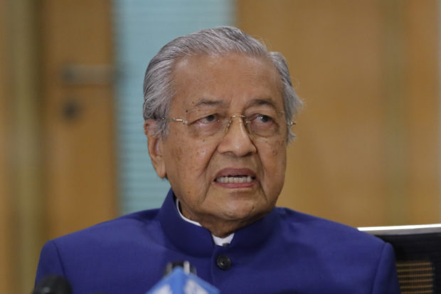Malaysian ex-PM Mahathir in hospital with coronavirus