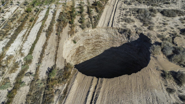 Sinkhole larger than tennis court has Chile perplexed