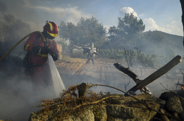 Spain wildfire forces evacuations, destroys land