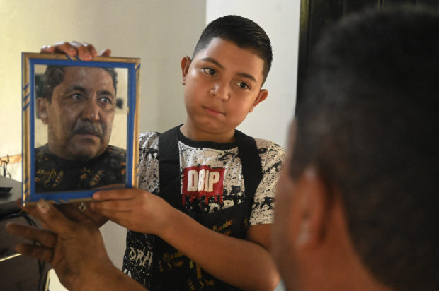 Childhood cut short: Honduran boy, 12, wielding barber’s shears