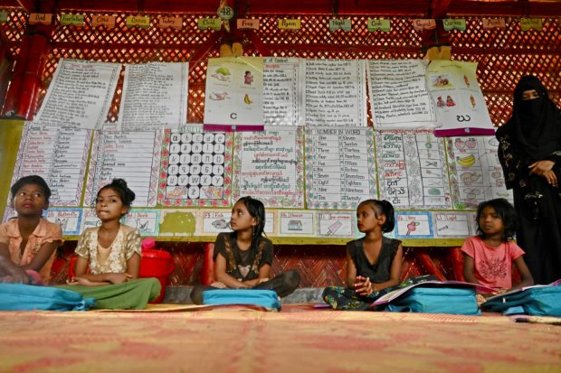 Songs of praise: Rohingya sing Myanmar anthem 5 years after exodus