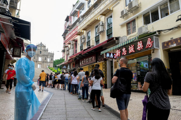 Macau returns to mass COVID-19 testing after case in neighboring Chinese city Zhuhai