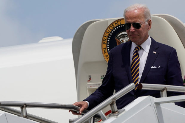 FILE PHOTO: U.S. President Joe Biden walks from Air Force One as he arrives at Joint Base Charleston in South Carolina, U.S., August 10, 2022. REUTERS/Joshua Roberts