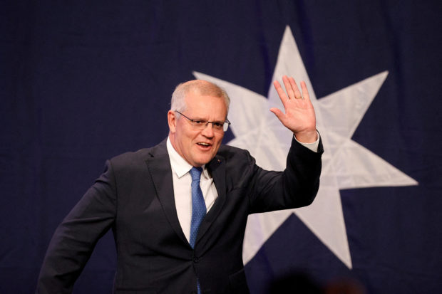 FILE PHOTO: Scott Morrison, leader of the Australian Liberal Party, arrives to address supporters  in Sydney, Australia, May 21, 2022. REUTERS/Loren Elliott//File Photo
