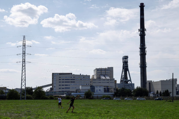 In Poland, where coal is king, homeowners queue for days to buy fuel