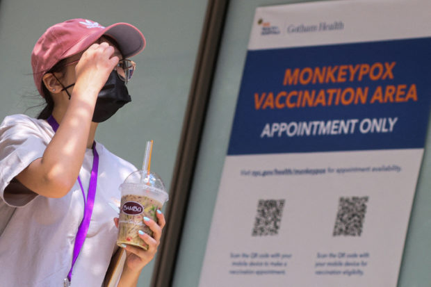A woman arrives at a monkeypox vaccination site in New York. STORY: US gov’t to provide $11 million for production of monkeypox vaccine 