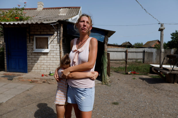 Despite shelling, family life goes on in cellar in eastern Ukraine