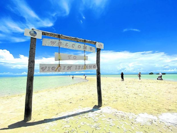 Tourists visit Virgin Island in Panglao, Bohol province where food vendors are no longer allowed