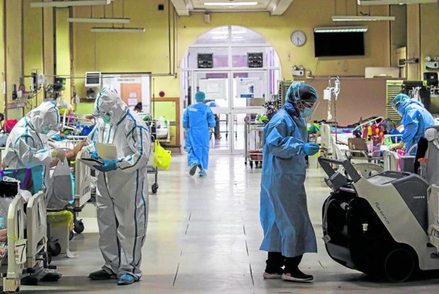 COVID-19 frontliners in a Metro Manila hospital. STORY: COVID-19 cases down for first time since June
