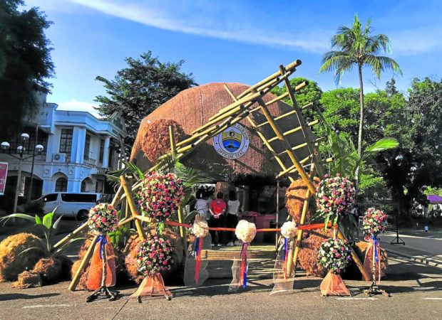 The “tagayan” booth at the Quezon capitol grounds offers visitors a shot of “lambanog." STORY: Quezon governor wants coconut fest to help more farmers