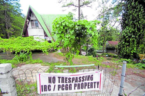 House and lot with sign saying PCGG PROPERTY. STORY: PCGG paradox: Agency battles abolition calls