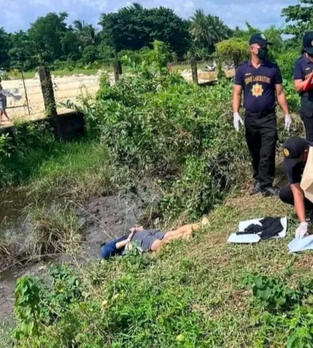Police authorities find the lifeless body of 25-year-old Eugene del Rosario along the Eco Tourism Road in Sitio Pontor, Barangay Bignay 2 on Wednesday, August 17, 2022.