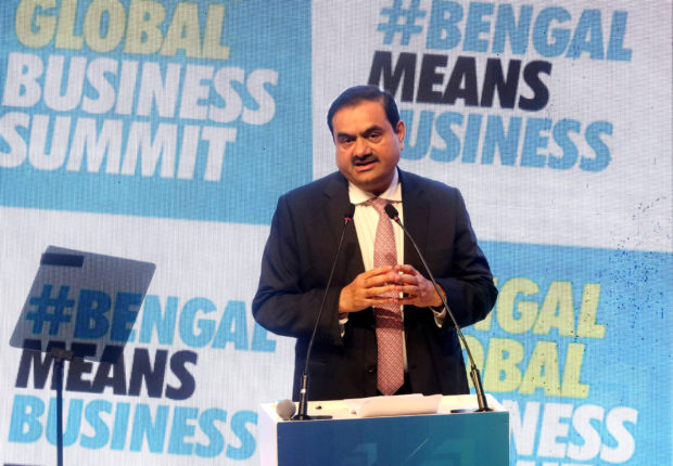 ndian billionaire Gautam Adani addresses delegates during the Bengal Global Business Summit in Kolkata