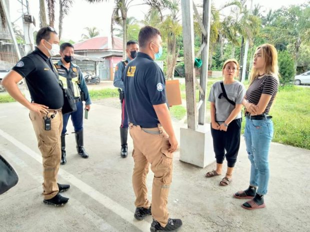 Social media personality Norme Garcia faces investigators from the PNP-HPG. Image from PNP-HPG