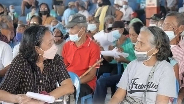 PHOTO: Senior citizens in San Marcelino town, Zambales province, wait to receive their P3,000 social pension from the government on Thursday, Nov. 18, 2021. STORY: Bongbong Marcos signs expanded Centenarian Law