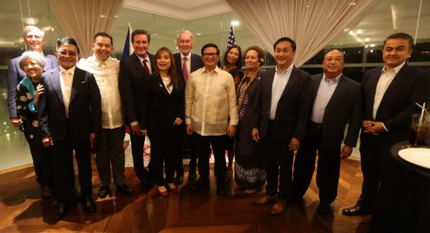 Members of US and Philippine delegations discuss matters related to the two countries during the US-Philippines Congressional Delegation Friendship Caucus held at the Manila Golf and Country Club on Thursday night. (Photos from Office of Speaker Martin Romualdez)