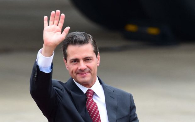 FILE PHOTO: Mexico's Financial Intelligence Unit revealed that their former President Enrique Pena Nieto was facing a probe over more than a million dollars of international money transfers. (Photo taken last November 29, 2018 by Martin BERNETTI / AFP)