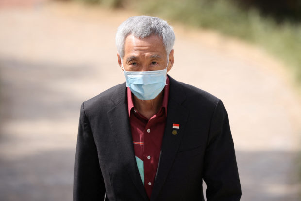 FILE PHOTO: Singaporean Prime Minister Lee Hsien Loong arrives for the Leaders' Retreat, on the sidelines of the Commonwealth Heads of Government Meeting at the Intare Conference center in Kigali, Rwanda June 25, 2022. Dan Kitwood/Pool via REUTERS