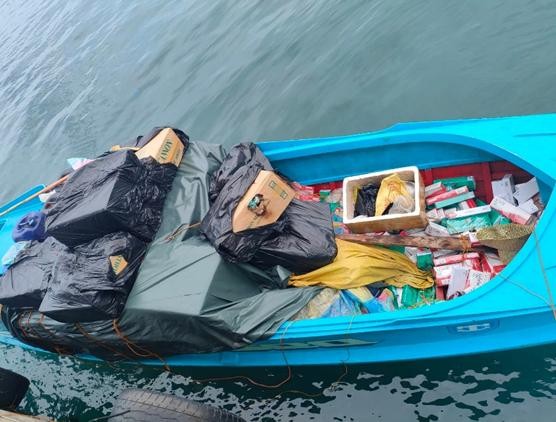 More than P1.5-million worth of smuggled cigarettes seized in a motorized boat off the coast of Zamboanga City on Wednesday, August 10, 2022. (Photo from the Philippine National Police)