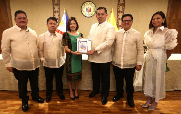 House of Representatives officials led by Speaker Ferdinand Martin Romualdez formally receive the proposed 2023 national budget from the Department of Budget and Management (DBM) Secretary Amenah Pangandaman. (Photo from Speaker Martin Romualdez' office)