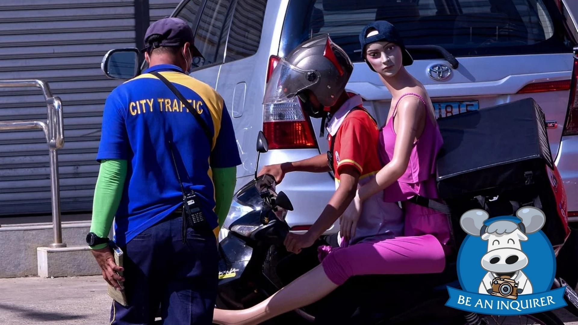 Helmetless motorcycle passenger nabbed by traffic cops turns out to be a mannequin