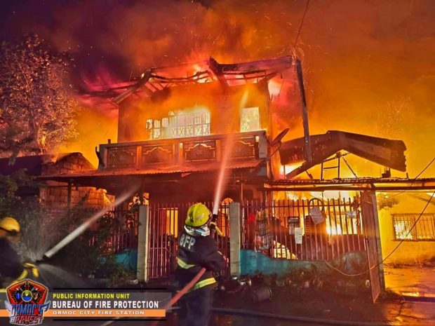 Firefighters try to put out the fire in Barangay Cogon, Ormoc City at around 2:26 a.m. on Sunday. (Photo courtesy of the Bureau of Fire Protection-Ormoc City)