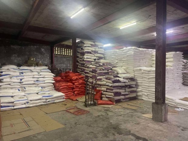 Sacks of sugar piled up at the raided warehouse in Pampanga (Photo from Office of the Press Secretary)
