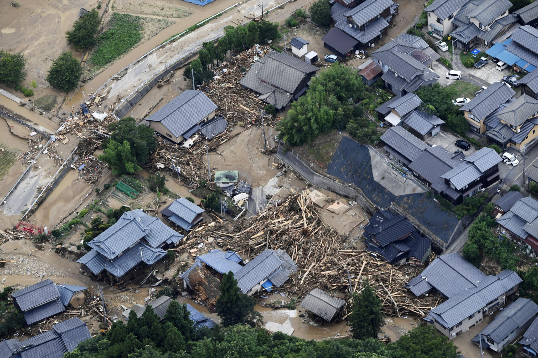 Three missing, thousands ordered evacuated as rain pounds northern