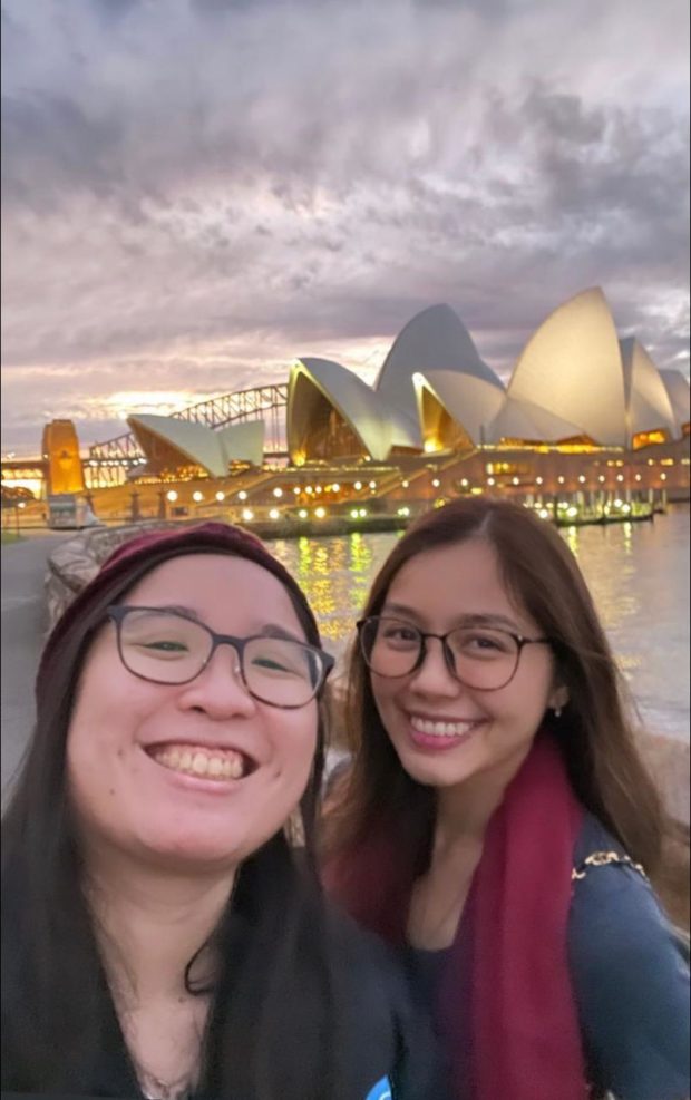 Nica del Rosario shares a photo of her and partner Justine Pena in front of the Sydney Opera House in Australia on Thursday, August 18, 2022.