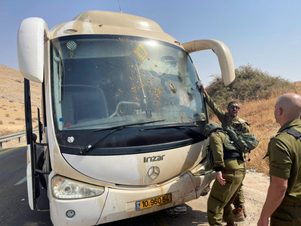 A Palestinian gunman killed two Israeli brothers as they were driving in the occupied West Bank on February 26, sparking attacks by Israeli settlers on houses and cars during which one Palestinian was killed.