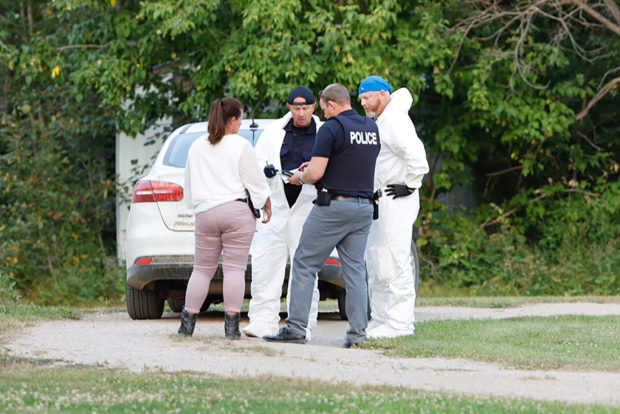 A police forensics team investigates a crime scene after multiple people were killed and injured in a stabbing spree in Weldon, Saskatchewan, Canada. September 4, 2022.  REUTERS/David Stobbe