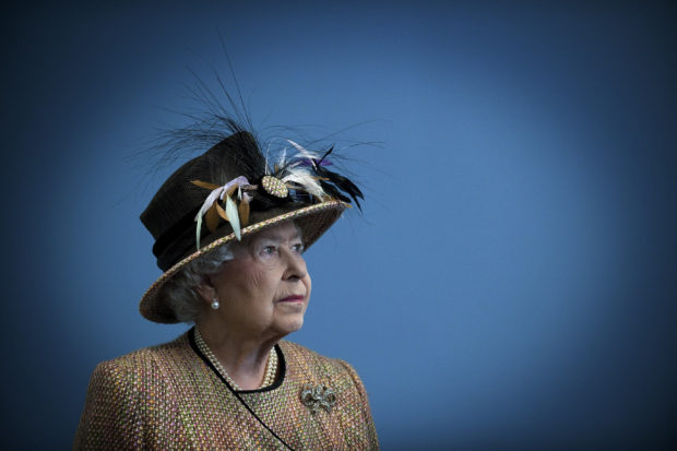 FILE PHOTO: Britain's Queen Elizabeth views the interior of the refurbished East Wing of Somerset House at King's College in London February 29, 2012. The Queen is celebrating her sixtieth anniversary as Regent in 2012. REUTERS/Eddie Mulholland/POOL (BRITAIN - Tags: ROYALS ENTERTAINMENT EDUCATION TPX IMAGES OF THE DAY)
