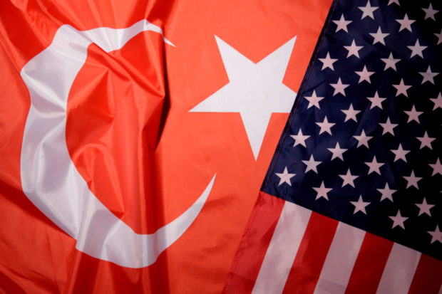 FILE PHOTO: Turkey and U.S. flags are seen in this picture illustration taken August 25, 2018. Picture taken August 25, 2018. REUTERS/Dado Ruvic/Illustration//