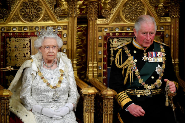 FILE PHOTO: Britain's Queen Elizabeth and Charles, the Prince of Wales are seen ahead the Queen's Speech during the State Opening of Parliament in London, Britain October 14, 2019. REUTERS/Toby Melville/Pool/File Photo