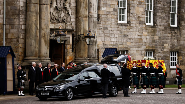 Pallbearers carry the coffin of Britain's Queen Elizabeth as the hearse arrives at the Palace of Holyroodhouse in Edinburgh, Scotland, Britain, September 11, 2022. REUTERS/Alkis Konstantinidis/Pool