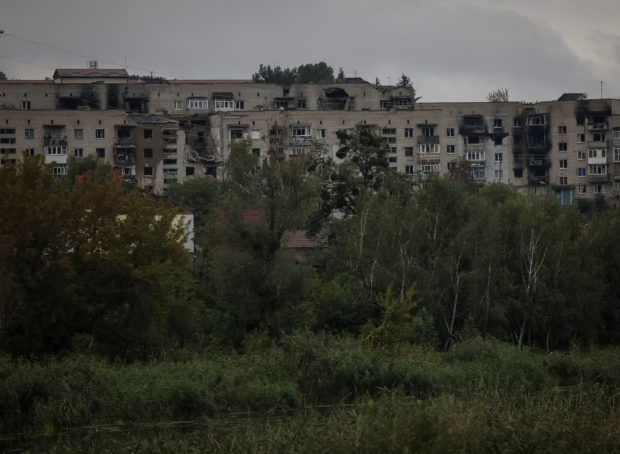 FILE PHOTO - Damaged apartments are seen, as Russia's attack on Ukraine continues, in the town of Izium, recently liberated by Ukrainian Armed Forces, in Kharkiv region, Ukraine September 14, 2022. REUTERS/Gleb Garanich