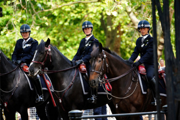 FILE PHOTO: Mounted Metropolitan Police outside Wellington Barracks, central London, ahead of the ceremonial procession of the coffin of Queen Elizabeth II from Buckingham Palace to Westminster Hall, London. Picture date: Wednesday September 14, 2022. Ben Birchall/Pool via REUTERS/