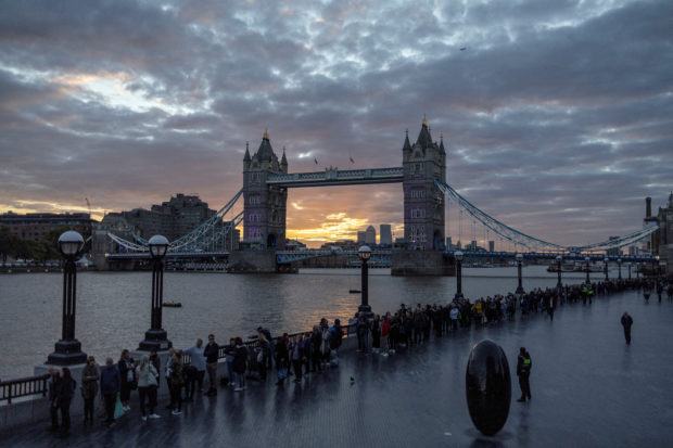 People queue near Tower Bridge to pay their respects following the death of Britain's Queen Elizabeth, in London, Britain, September 16, 2022. REUTERS/Alkis Konstantinidis