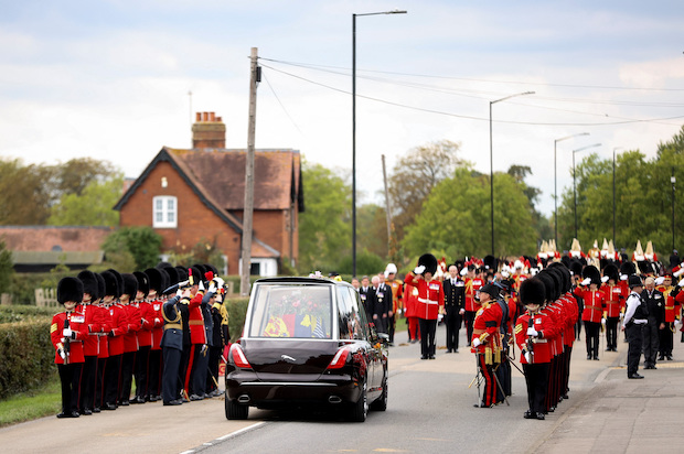 Hearse bearing the coffin of Queen Elizabeth II on Albert Road. STORY: World says goodbye to Queen Elizabeth from cafes, consulates
