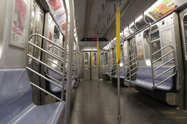 FILE PHOTO - An empty subway car is seen during the morning rush, following the outbreak of Coronavirus disease (COVID-19), in New York City, U.S., March 19, 2020. REUTERS/Lucas Jackson