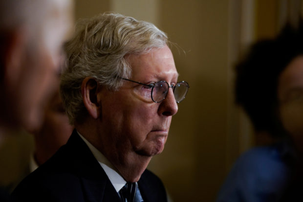 FILE PHOTO: U.S. Senate Minority Leader Mitch McConnell (R-KY) speaks to reporters following the Senate Republicans weekly policy lunch at the U.S. Capitol in Washington, U.S., September 20, 2022. REUTERS/Elizabeth Frantz/File Photo
