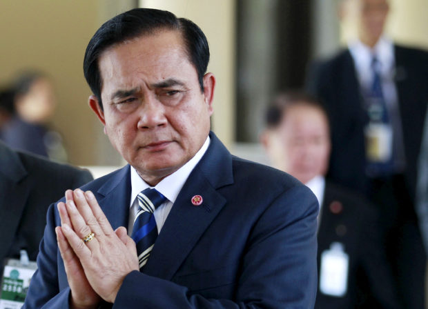 FILE PHOTO: Thailand's Prime Minister Prayuth Chan-ocha gestures after presiding over Thailand Corporate Excellence Award for Financial Management at the Government House in Bangkok, Thailand, September 9, 2015. REUTERS/Chaiwat Subprasom/File Photo