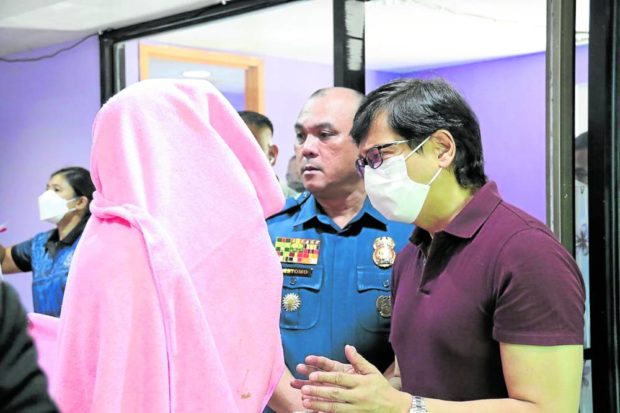 DILG Secretary Benhur Abalos during a raid in a sex den in Manila. CONTRIBUTED PHOTO