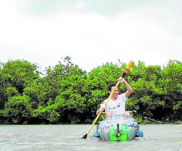 Gary Bencheghib, here paddling away on his improvised kayak down Indonesia’s Citarum River