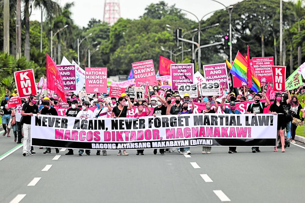 Activists and human rights advocates take the battle against historical distortion to the streets as they mark the 50th anniversary of the declaration of martial law